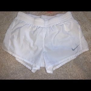 White Nike shorts